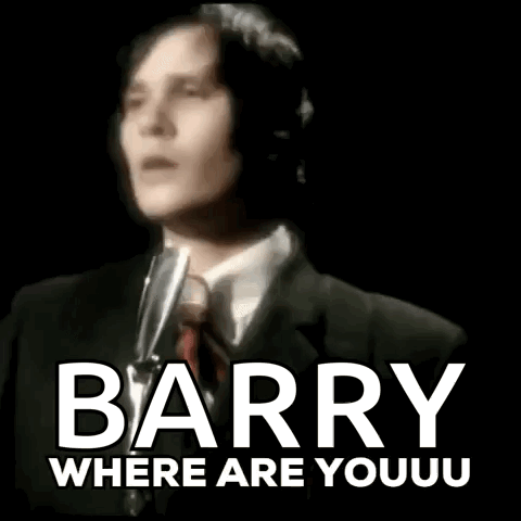 A Man In A Suit And Tie Is Singing Into A Microphone With The Words Barry Where Are Youuu Below Him . GIF