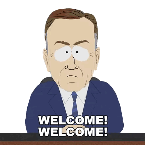 A Man In A Suit And Tie Is Sitting At A Desk And Says Welcome Sticker