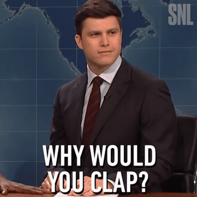 A Man In A Suit And Tie Is Sitting At A Desk And Says " Why Would You Clap " GIF