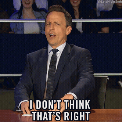 A Man In A Suit And Tie Is Sitting At A Table And Says I Don 'T Think That 'S Right GIF