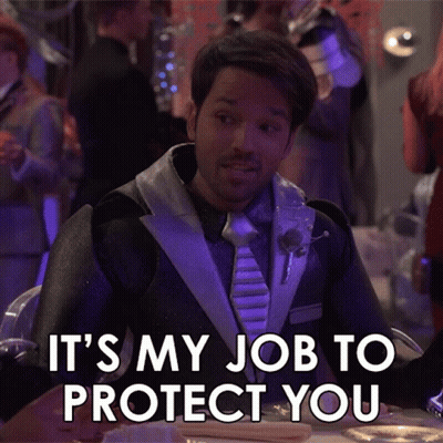 A Man In A Suit And Tie Is Sitting At A Table And Says It 'S My Job To Protect You GIF