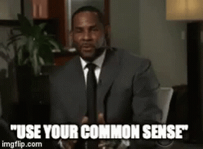 A Man In A Suit And Tie Is Sitting At A Table And Says " Use Your Common Sense " GIF