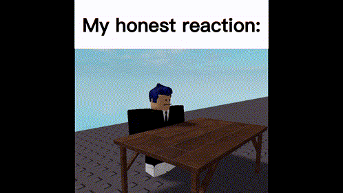 A Man In A Suit And Tie Is Sitting At A Table . GIF