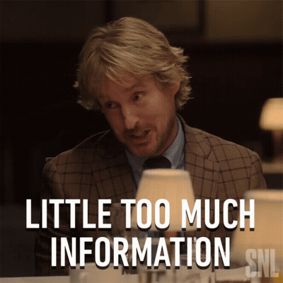 A Man In A Suit And Tie Is Sitting At A Table With The Caption Little Too Much Information Snl GIF