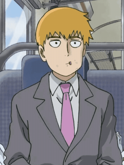 A Man In A Suit And Tie Is Sitting In A Bus GIF