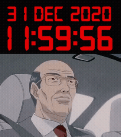 A Man In A Suit And Tie Is Sitting In A Car Under A Digital Clock That Says 11:59 GIF