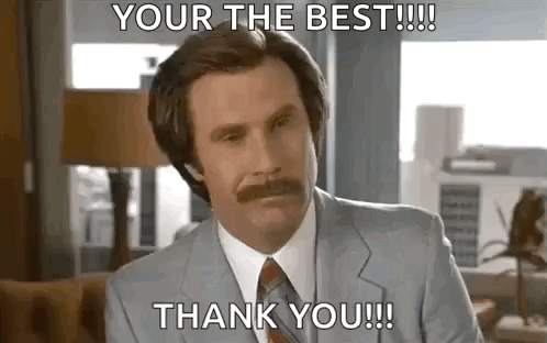 A Man In A Suit And Tie Is Sitting In A Chair And Saying `` Your The Best !!! Thank You !!! '' . GIF