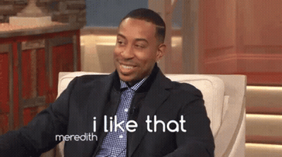 A Man In A Suit And Tie Is Sitting In A Chair And Says I Like That Meredith . GIF