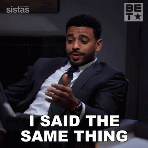 A Man In A Suit And Tie Is Sitting In A Chair And Says I Said The Same Thing GIF