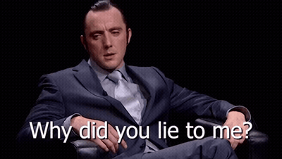 A Man In A Suit And Tie Is Sitting In A Chair With His Eyes Closed And The Words Why Did You Lie To Me Above Him GIF