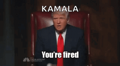 A Man In A Suit And Tie Is Sitting In A Chair With The Words Kamala You 'Re Fired Below Him GIF
