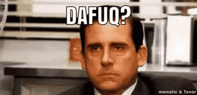 A Man In A Suit And Tie Is Sitting In Front Of A Computer Screen With A Caption That Says Dafuq ? GIF