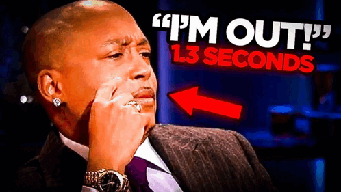 A Man In A Suit And Tie Is Sitting In Front Of A Sign That Says " I 'M Out 1.3 Seconds " . GIF