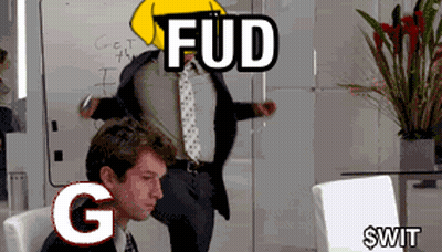 A Man In A Suit And Tie Is Sitting In Front Of A White Board With The Words Fud G And $ Wit GIF