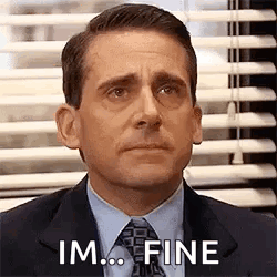 A Man In A Suit And Tie Is Sitting In Front Of A Window With Blinds And Saying `` Im ... Fine '' . GIF