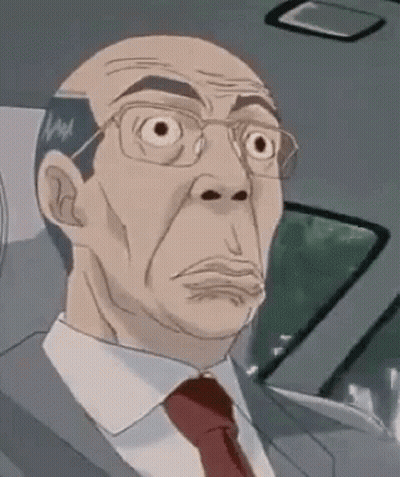 A Man In A Suit And Tie Is Sitting In The Back Seat Of A Car Making A Funny Face . GIF
