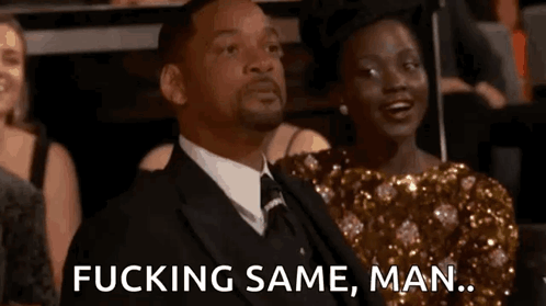 A Man In A Suit And Tie Is Sitting Next To A Woman In A Gold Dress And Says " Fucking Same Man " . GIF
