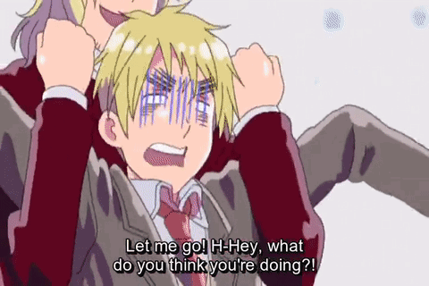 A Man In A Suit And Tie Is Sitting On A Woman 'S Shoulders And Talking To Her . GIF
