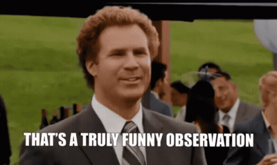 A Man In A Suit And Tie Is Smiling And Saying That 'S A Truly Funny Observation . GIF