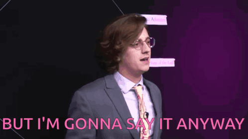 A Man In A Suit And Tie Is Smiling And Says But I 'M Gonna Say It Anyway GIF