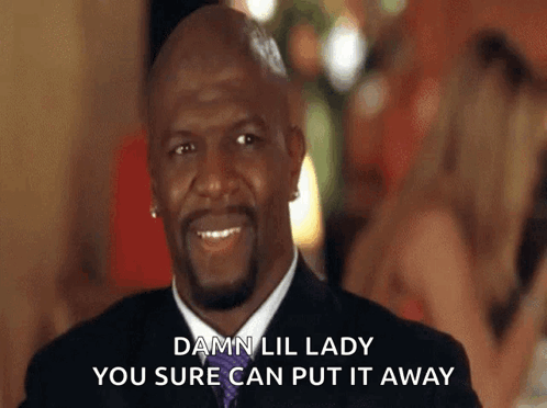 A Man In A Suit And Tie Is Smiling And Says Damn Lil Lady You Sure Can Put It Away GIF