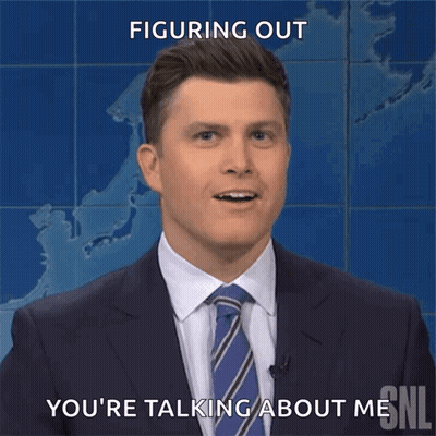 A Man In A Suit And Tie Is Smiling And Says " Figuring Out You 'Re Talking About Me " GIF