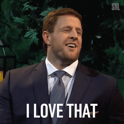 A Man In A Suit And Tie Is Smiling And Says I Love That GIF