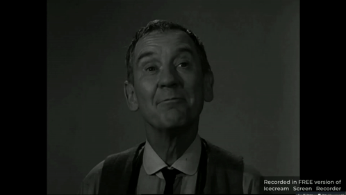 A Man In A Suit And Tie Is Smiling In A Free Version Of Icecream Screen Recorder GIF