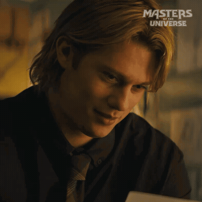 A Man In A Suit And Tie Is Smiling In A Masters Of The Universe Advertisement GIF