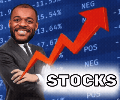 A Man In A Suit And Tie Is Smiling In Front Of A Stocks Chart GIF