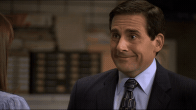 A Man In A Suit And Tie Is Smiling With The Words I 'M Joking Below Him GIF