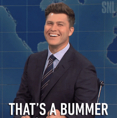 A Man In A Suit And Tie Is Smiling With The Words That 'S A Bummer Behind Him GIF