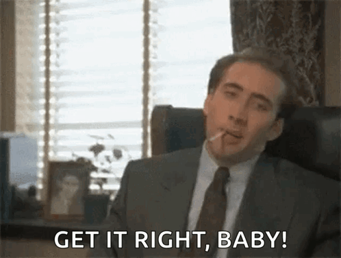 A Man In A Suit And Tie Is Smoking A Cigarette And Saying Get It Right , Baby . GIF