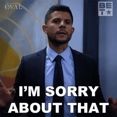 A Man In A Suit And Tie Is Sorry About That GIF