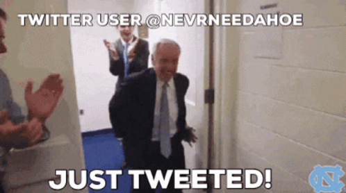 A Man In A Suit And Tie Is Standing In A Doorway With The Words Just Tweeted GIF