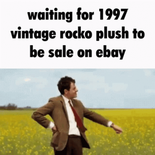 Man In Suit Waiting For Vintage Rocko Plush GIF