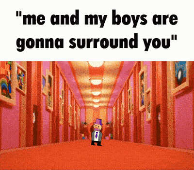 A Man In A Suit And Tie Is Standing In A Hallway With The Caption " Me And My Boys Are Gonna Surround You GIF