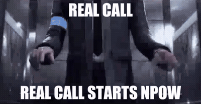 A Man In A Suit And Tie Is Standing In An Elevator With His Arms Outstretched And The Words `` Real Call '' . GIF