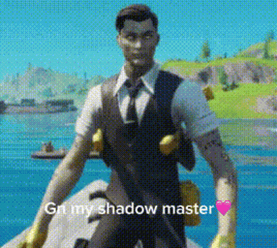 A Man In A Suit And Tie Is Standing In Front Of A Body Of Water Holding A Gun . GIF