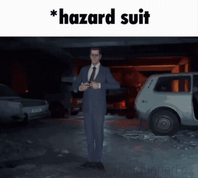 A Man In A Suit And Tie Is Standing In Front Of A Car With The Words Hazard Suit Written On The Bottom GIF