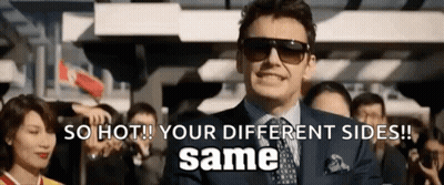 A Man In A Suit And Tie Is Standing In Front Of A Crowd And Says So Hot Your Different Sides Same . GIF