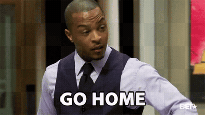 A Man In A Suit And Tie Is Standing In Front Of A Door And Saying `` Go Home '' . GIF