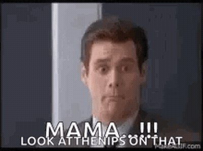 A Man In A Suit And Tie Is Standing In Front Of A Door And Says `` Mama Look At The Nips On That '' GIF