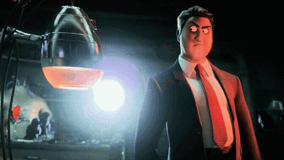 A Man In A Suit And Tie Is Standing In Front Of A Light GIF