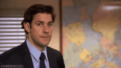 A Man In A Suit And Tie Is Standing In Front Of A Map With The Hashtag Tannerfrizzell GIF