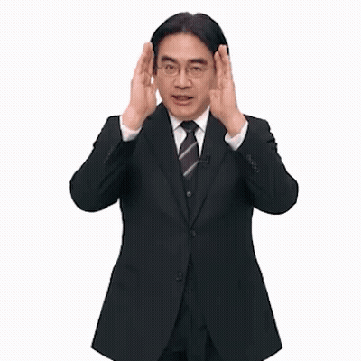 A Man In A Suit And Tie Is Standing In Front Of A Sign That Says Full Focus GIF