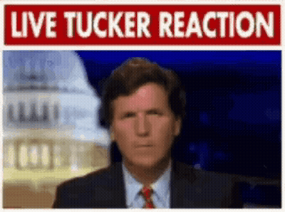 A Man In A Suit And Tie Is Standing In Front Of A Sign That Says " Live Tucker Reaction " GIF