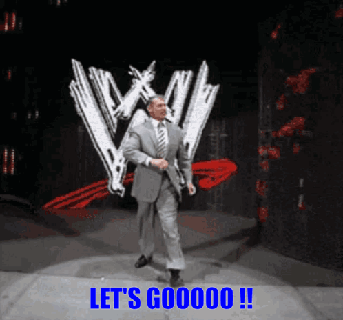 A Man In A Suit And Tie Is Standing In Front Of A W Logo And Says Let 'S Gooooo !! GIF