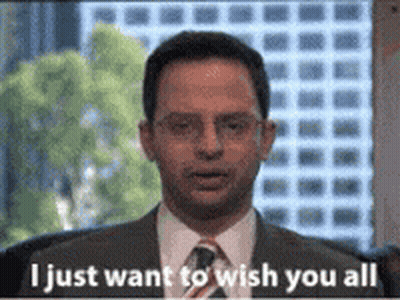 A Man In A Suit And Tie Is Standing In Front Of A Window And Saying `` I Just Want To Wish You All '' . GIF
