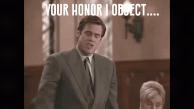 A Man In A Suit And Tie Is Standing In Front Of A Woman In A Courtroom And Says " Your Honor I Object ... " GIF